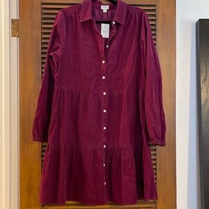 Brand new corduroy plum dress. Never worn. Button front.